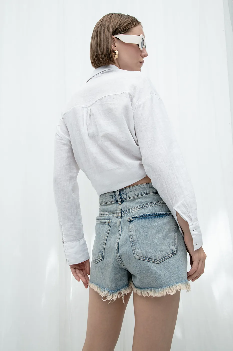 Bayan Mavi Yıpratmalı Denim Mini Şort